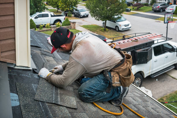 Professional Roof Replacement technician working in Smithfield, RI